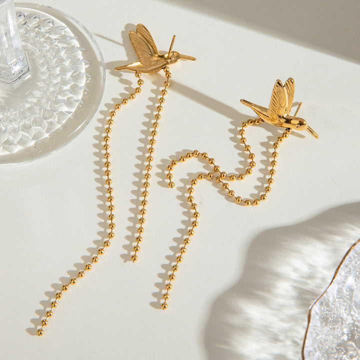 Aviya | Naušnice s pticom i visećim lancima