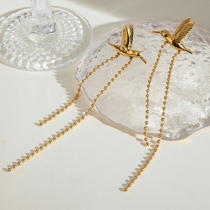 Aviya | Naušnice s pticom i visećim lancima